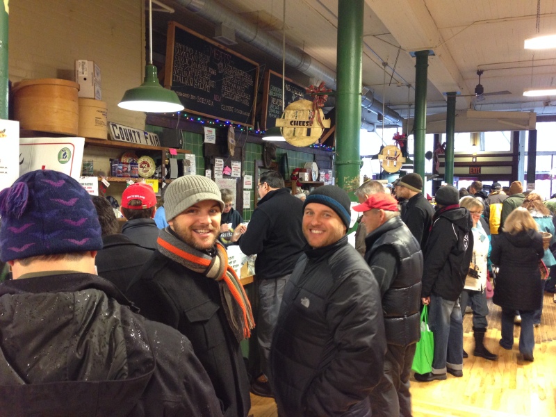 Brothers Jeff and Rob braving the crowds at Devries & Co. cheese store in Eastern Market